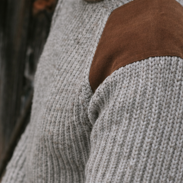 British wool sweater in grey - ribbed with suede shoulder patches.