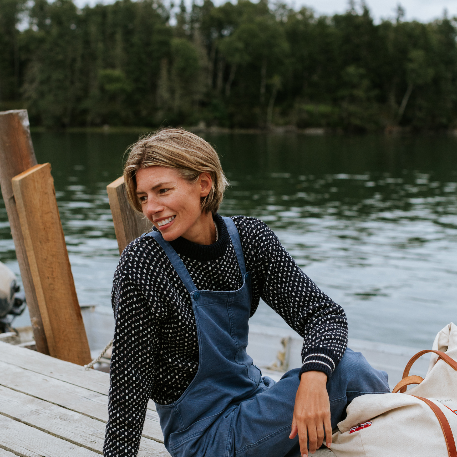 British wool nordic style fisherman sweater in white - ragg wool / birdseye style - navy blue - size extra small - female model