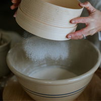 Classic country style martinez pottery handmade in the USA mixing bowl in kitchen during baking