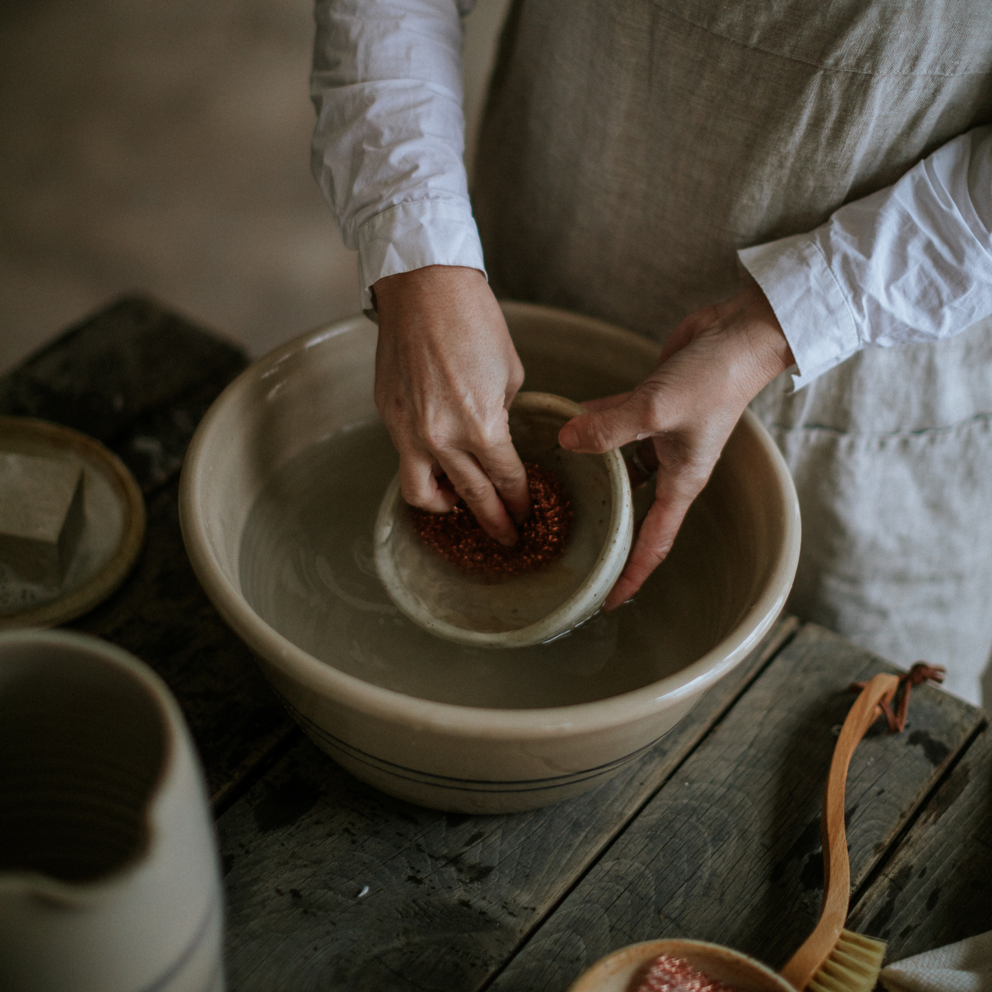 Classic country style martinez pottery handmade in the USA mixing bowl in kitchen during washing up