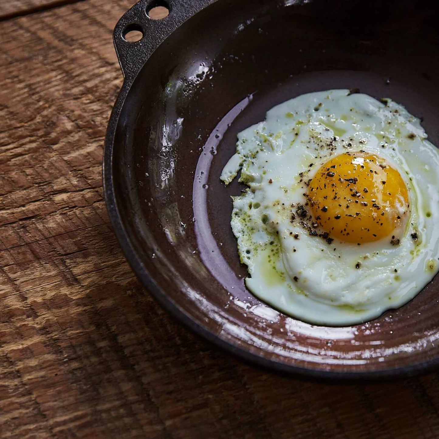 Smithey Cast Iron No. 8 Chef Skillet cooking an egg
