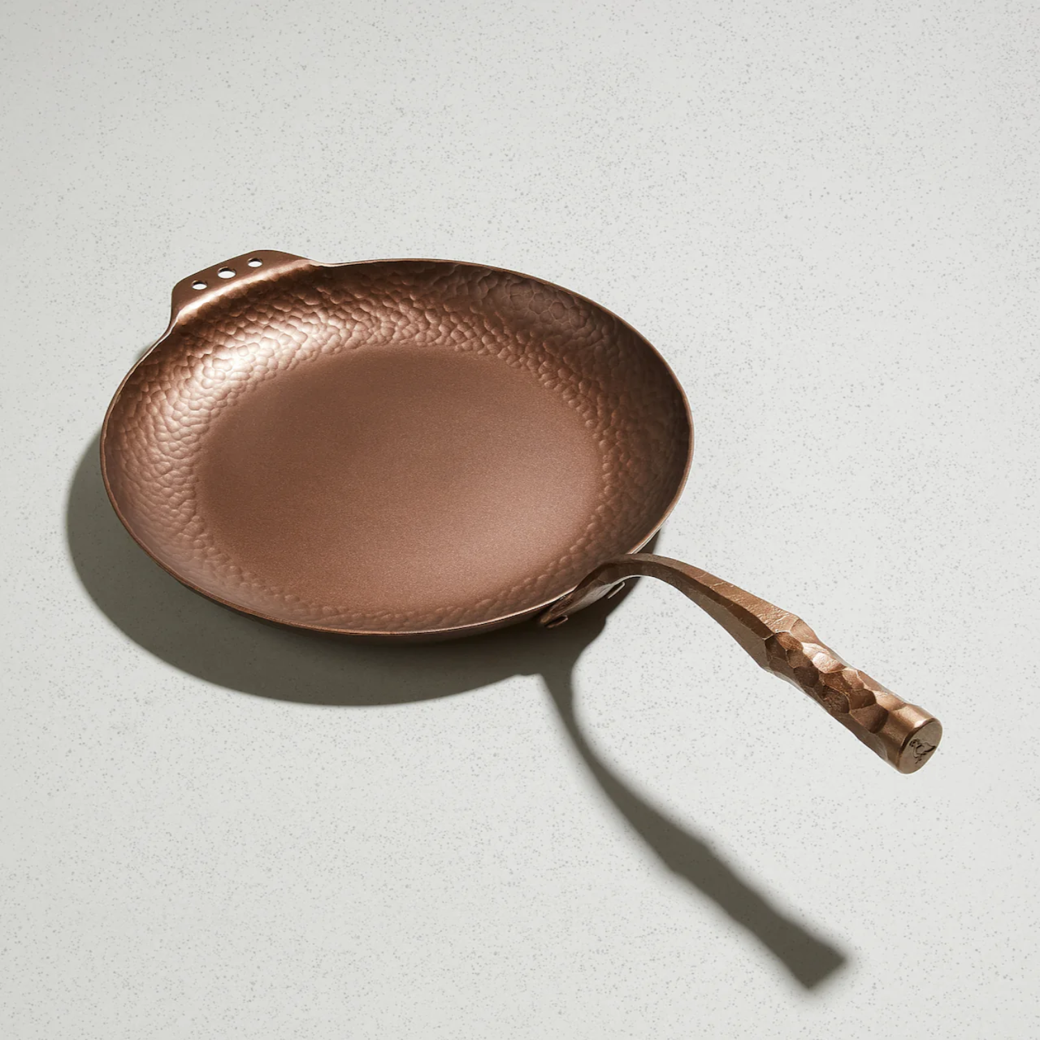 Smithey farmhouse skillet carbon steel on white surface