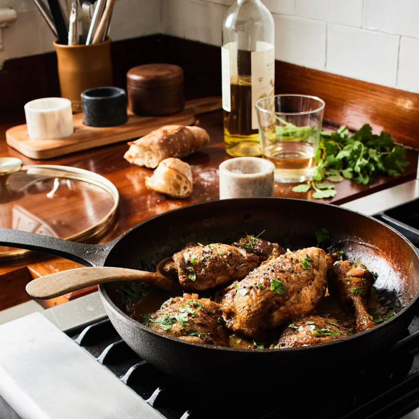 Smithey cast iron no. 11 pan with lid cooking chicken
