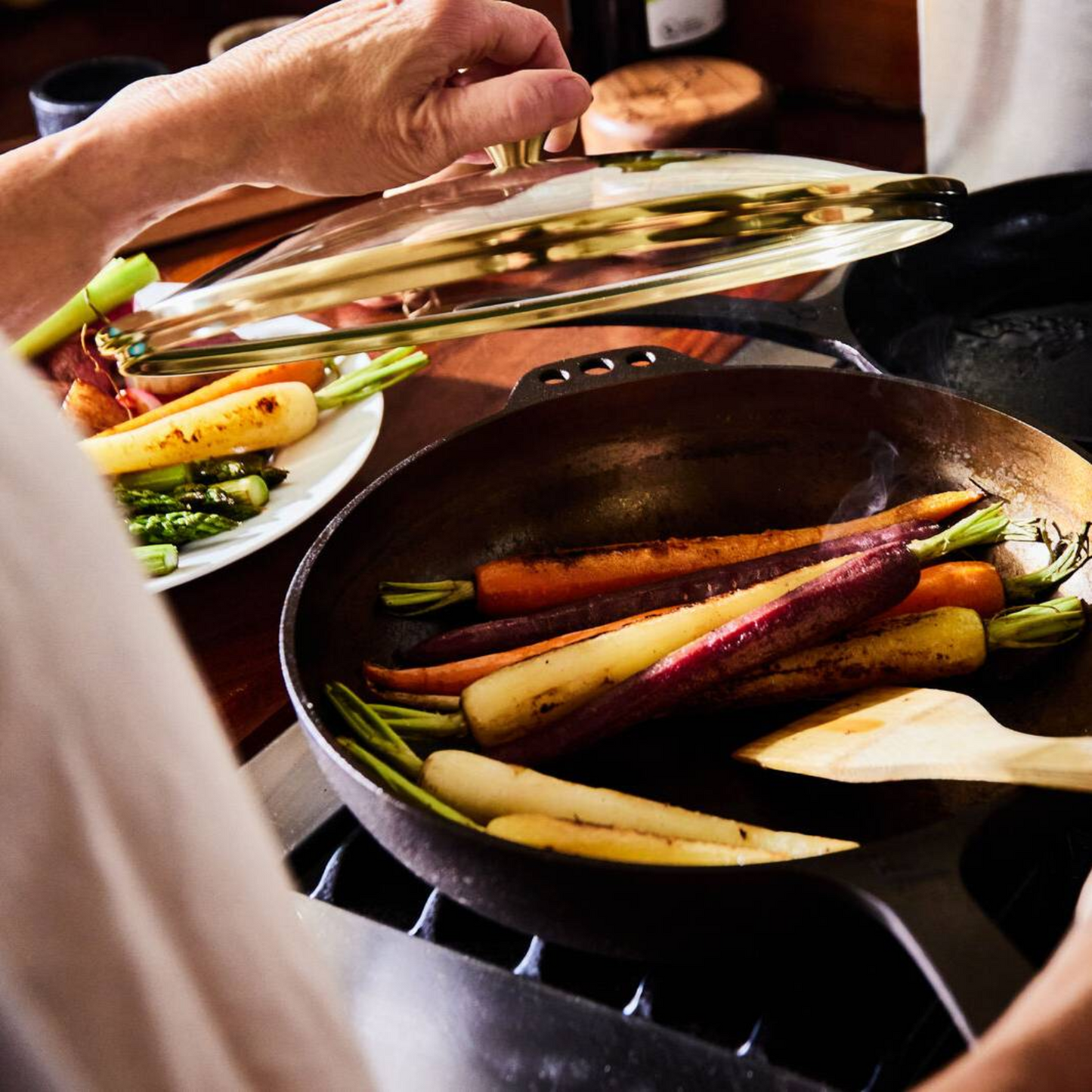 Smithey cast iron no. 11 pan with lid cooking vegetables